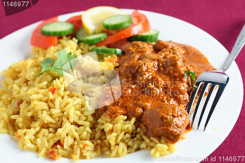 Image of Kashmiri lamb curry with rice and salad