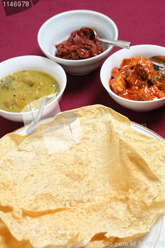 Image of Poppadoms with indian pickles