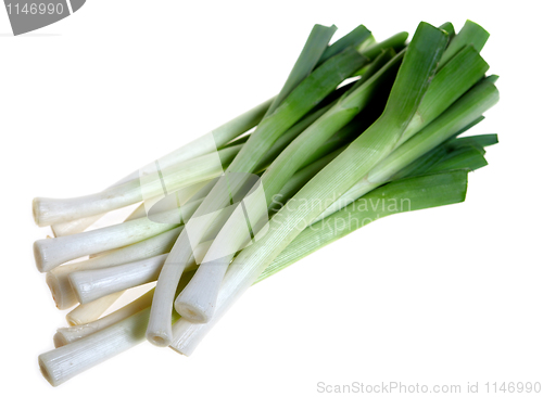 Image of Young leeks isolated on white