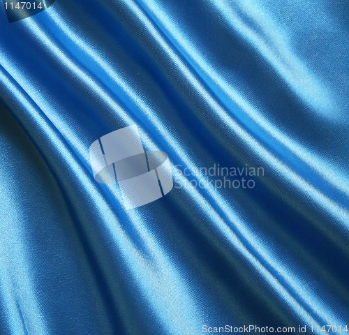 Image of Smooth elegant blue silk can use as background 