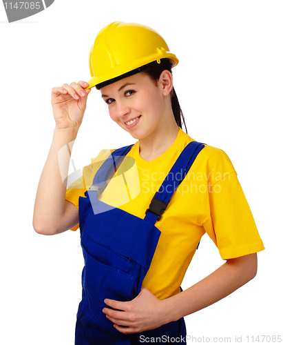 Image of Young beautiful woman in construction uniform