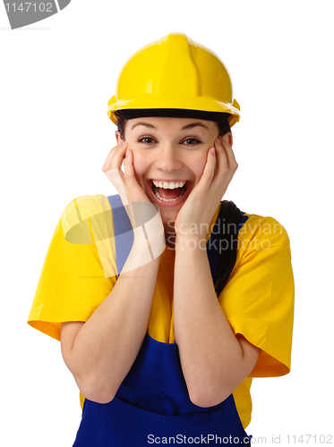 Image of Construction girl holding her face in astonishment