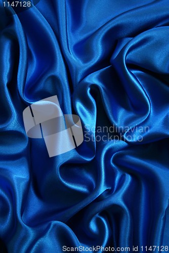 Image of Smooth elegant blue silk can use as background 