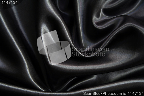 Image of Smooth elegant black silk can use as background 