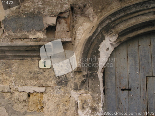 Image of Detail of dilapidated french village house.