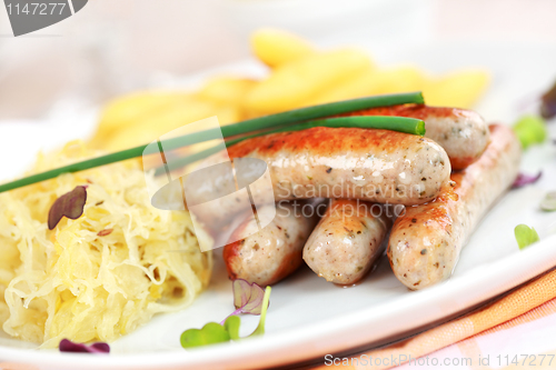 Image of White sausage with sour cabbage