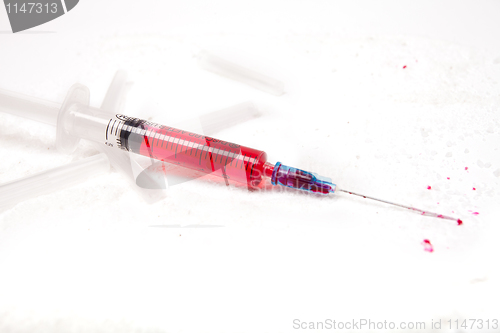 Image of Syringe with poison