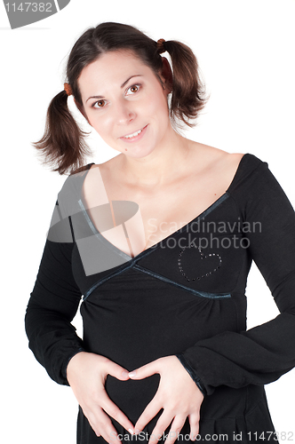 Image of Pregnant woman hands in form of heart sign