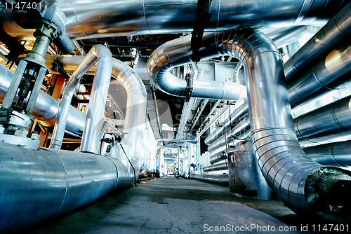 Image of Industrial zone, Steel pipelines in blue tones  