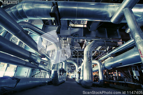 Image of Industrial zone, Steel pipelines in blue tones  