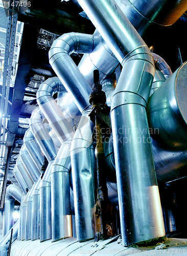 Image of Industrial zone, Steel pipelines in blue tones  