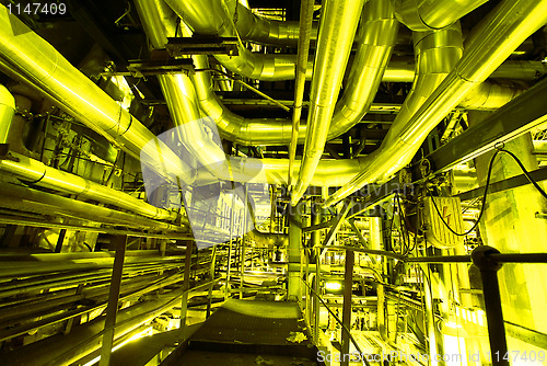 Image of Industrial zone, Steel pipelines, valves and ladders