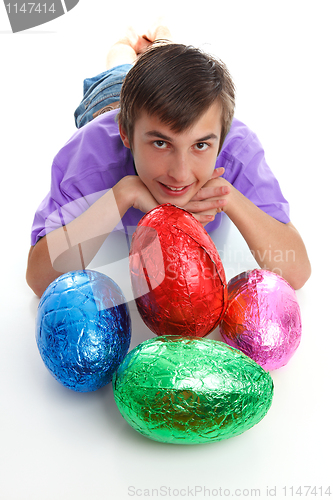 Image of Child with colourful easter eggs