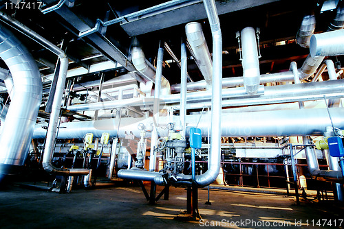 Image of Industrial zone, Steel pipelines in blue tones  