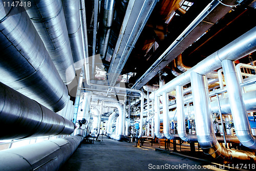 Image of Industrial zone, Steel pipelines in blue tones  