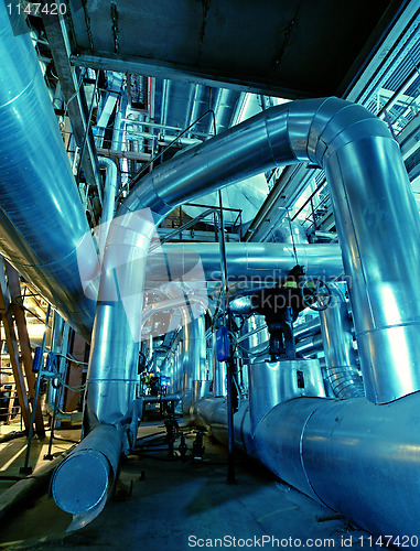 Image of Industrial zone, Steel pipelines in blue tones  