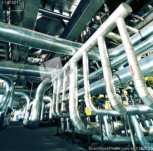 Image of Industrial zone, Steel pipelines in blue tones  