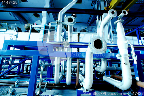 Image of Industrial zone, Steel pipelines in blue tones  