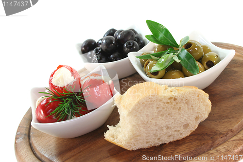 Image of stuffed peppers and olives