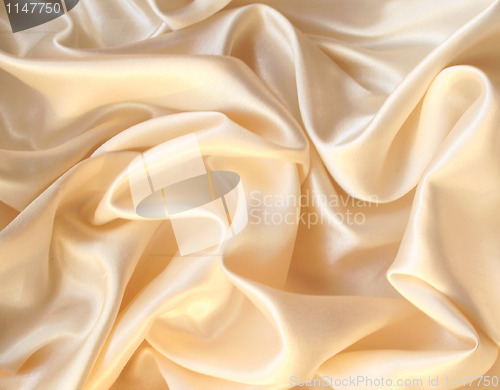 Image of Smooth elegant golden silk as background