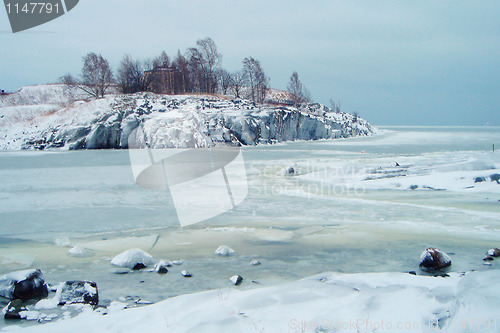 Image of Frozen sea blue landscape with mountain in Finland