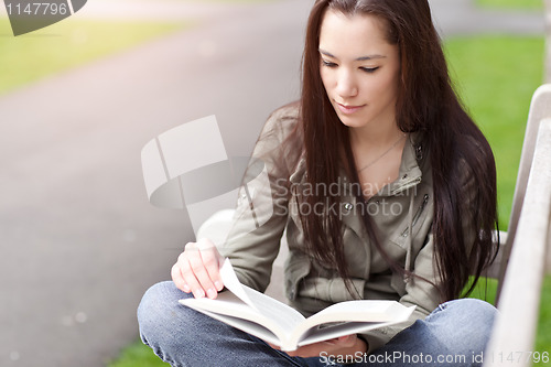 Image of Ethnic college student studying