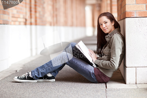 Image of Ethnic college student studying