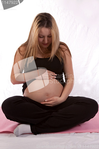 Image of Young pregnant mother