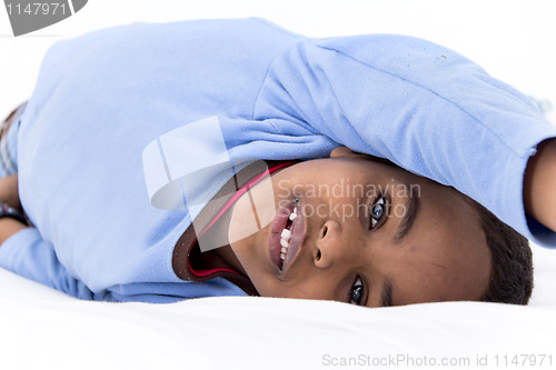 Image of Boy resting in his bed