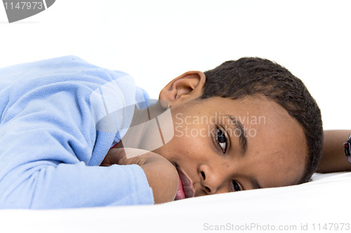 Image of Boy resting in his bed