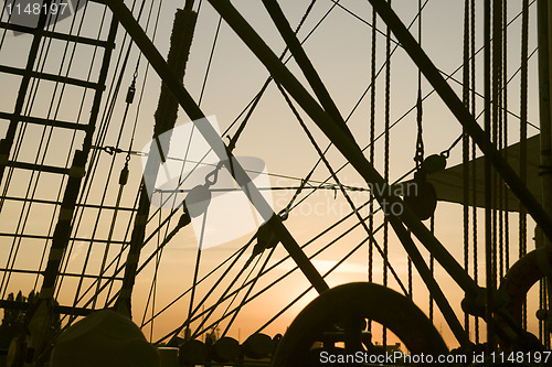 Image of Ship's rigging in the sunset