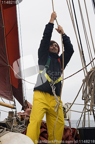 Image of Young sailor at work