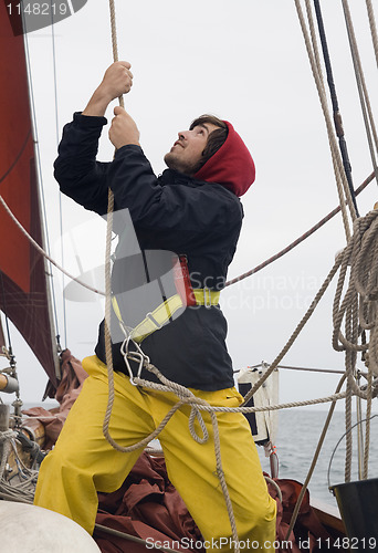 Image of Young sailor at work