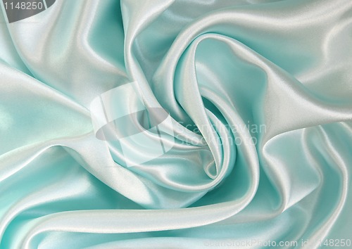 Image of Smooth elegant blue silk as background 