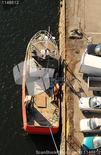 Image of Old steel boat at the doc.