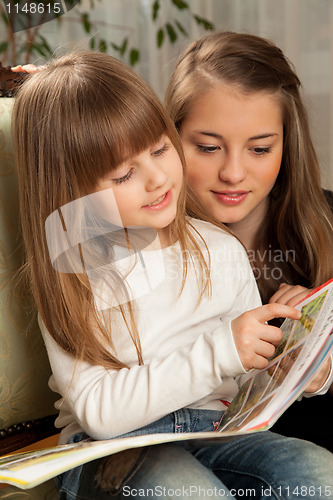 Image of Two Sisters Reading