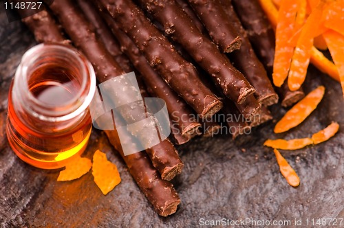 Image of chocolate sticks with orange