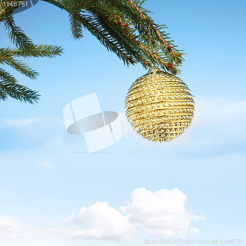 Image of bauble haning on christmas tree