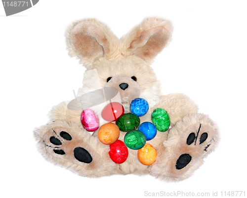 Image of Easter bunny with lots of colorful eggs 