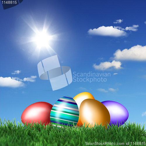 Image of Easter eggs on green grass 