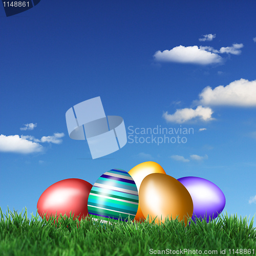 Image of Colored Easter eggs in grass 