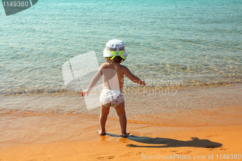 Image of little girl on beach