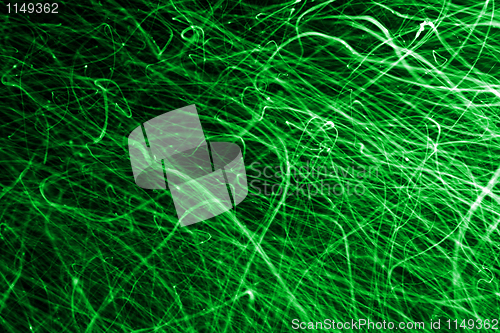 Image of abstract green chaos lines on black