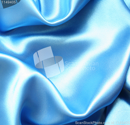 Image of Smooth elegant blue silk as background