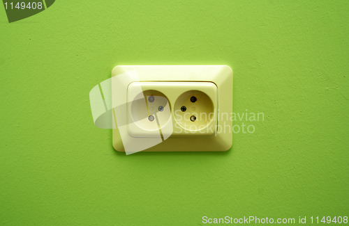 Image of White electric socket on the wall