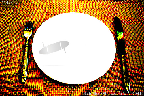 Image of white plate on the table