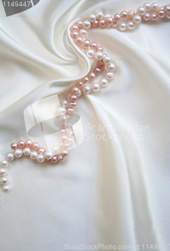 Image of Elegant white silk with white and pink pearls 