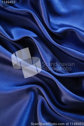 Image of Smooth elegant dark blue silk as background 