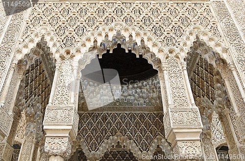 Image of Decorated arches and columns inside the Alhambra of Granada