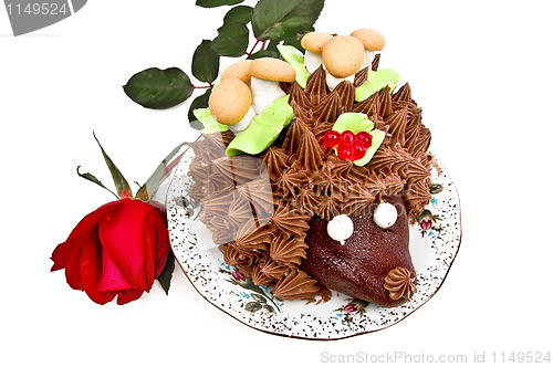 Image of Cake in the form of a hedgehog with a rose